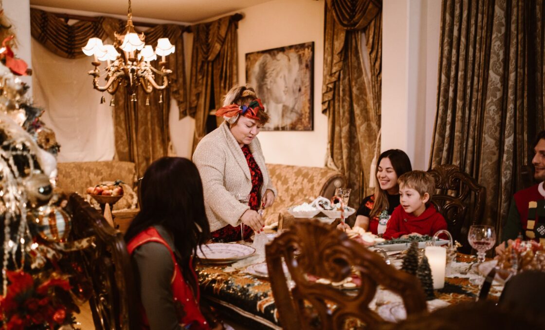 A family gathered around a table for a holiday meal