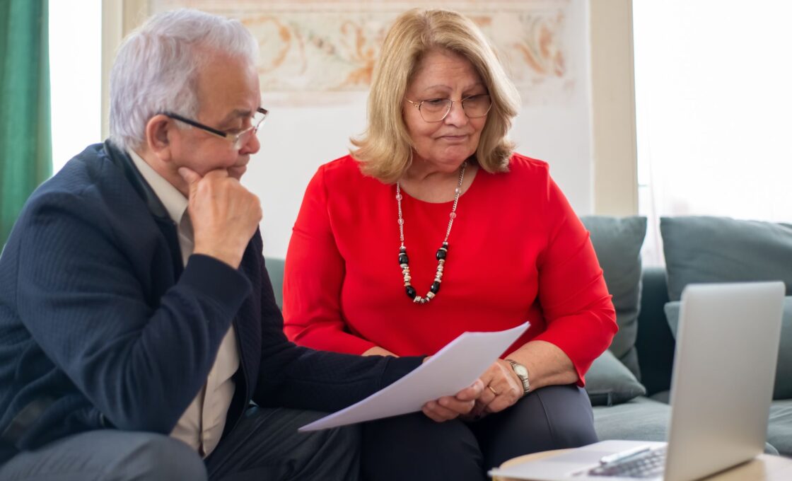 Woman reviewing retirement account options at a desk
