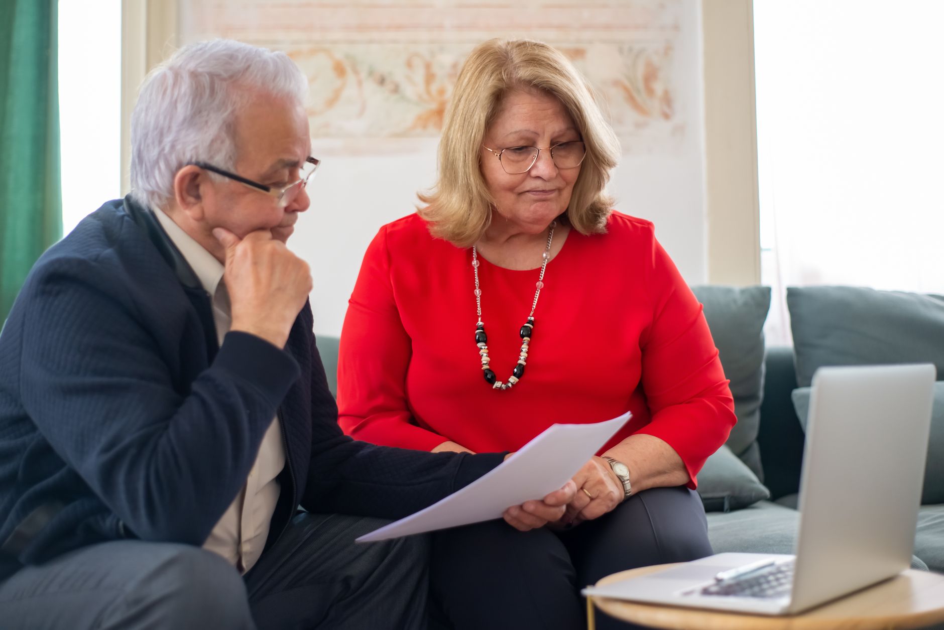 Woman reviewing retirement account options at a desk