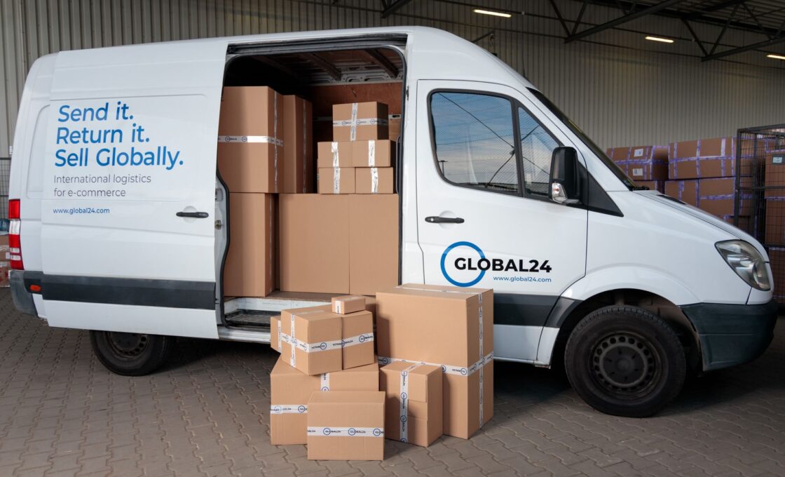 Woman handling a return shipping box, illustrating 2026 retail return policy changes