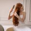 Why Your Summer Hair Damage Repair Routine Is Rinsing Down the Drain